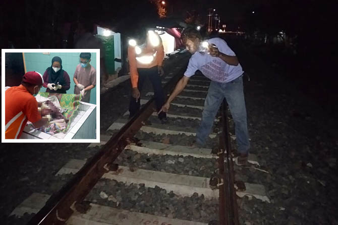Petugas mengecek lokasi tempat Muhammad Habibi, 7, ditabrak kereta pada Jumat (26/3), pukul 20.00 di perlintasan Imam Bonjol, Kelurahan Bugul Lor, Kecamatan Panggungrejo, Kota Pasuruan. (Istimewa) 