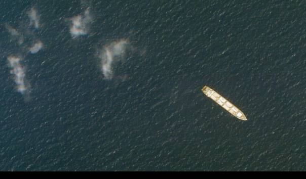 Ilustrasi kapal kargo yang tertahan di Teluk Suez, Mesir. (Sumber: Planet Labs Inc. via AP)
