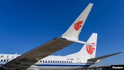Pesawat Boeing 737 MAX 8 milik maskapai penerbangan Air China, di landasan bandara di Beijing, China, 11 Maret 2019. (REUTERS/Stringer)