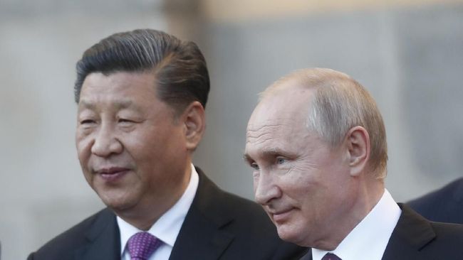 Presiden China Xi Jinping dan Presiden Rusia Vladimir Putin. 