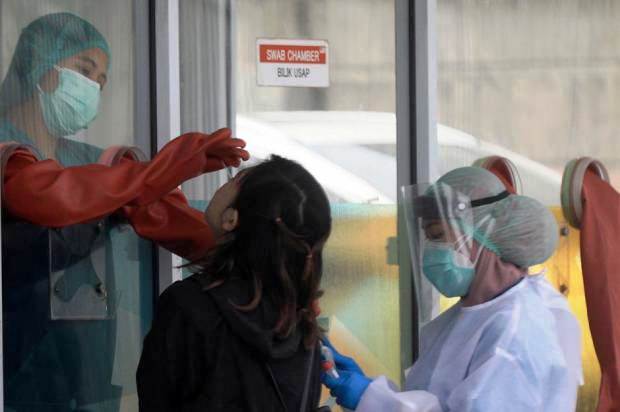 Ilustrasi penumpang bus di Swab Antigen di Terminal Kalideres Jakarta. (Ist.)