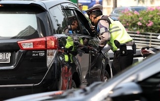 Operasi Zebra 2022 pada 3 - 16 Oktober akan mengandalkan tilang elektronik ETLE, polisi dilarang melakukan penindakan berupa tilang manual. (CNN Indonesia/Andry Novelino) 