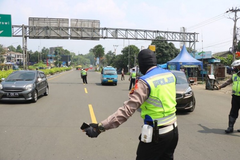 Polres Bogor akan memberlakukan sistem ganjil genap di jalur menuju Puncak saat libur Hari Raya Nyepi, cuti bersama, dan weekend. Penerapan pembatasan kendaraan ini dilakukan mulai 21-26 Maret 2023. Foto: istimewa.